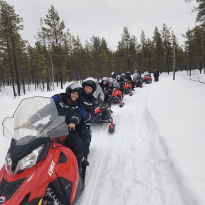 Ms. Shital Shah and her group enjoying a snowmobile safari in Finland with finlandtour.fi